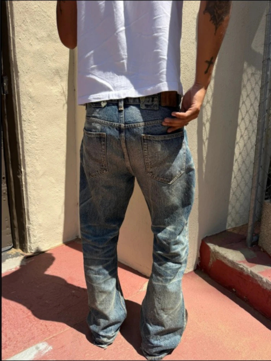 HEAVILY WASHED FLARE JEANS